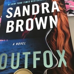 OUTFOXED hard cover book Sandra Brown